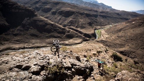 Foot traffic and livestock created the trails that we followed, and we spent long stretches negotiating loose, steep hillsides with our bikes balanced on our backs. It was the price for accessing remote villages that few travelers ever see.