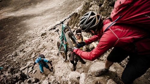 We summited Ras Deshan on day three, hand-over-handing bicycles in the final 200 vertical feet to the peak. The reward was three hours of nonstop of descending and a hero’s welcome in Ambiko camp, where our guides and mule men greeted us with dancing, clapping, and shrill ululations and presented us with white scarves and smudge sticks of rumax, a pink-flowered weed used for magic ceremonies.
