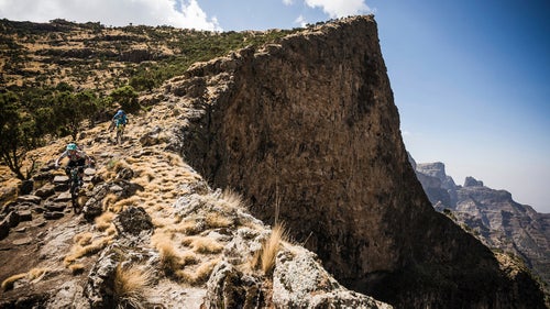 The first hour of riding presaged the difficulties of the climbs to come: In the little ring, up broad, open slopes, breathing as if through a straw because of the high altitude, with Ethiopian children easily keeping pace on foot. But from the day’s 13,353-foot high point, the escarpment dropped away like the Grand Canyon, and we sent baboons scuttling for cover on the rough-hewn trail down to camp two.