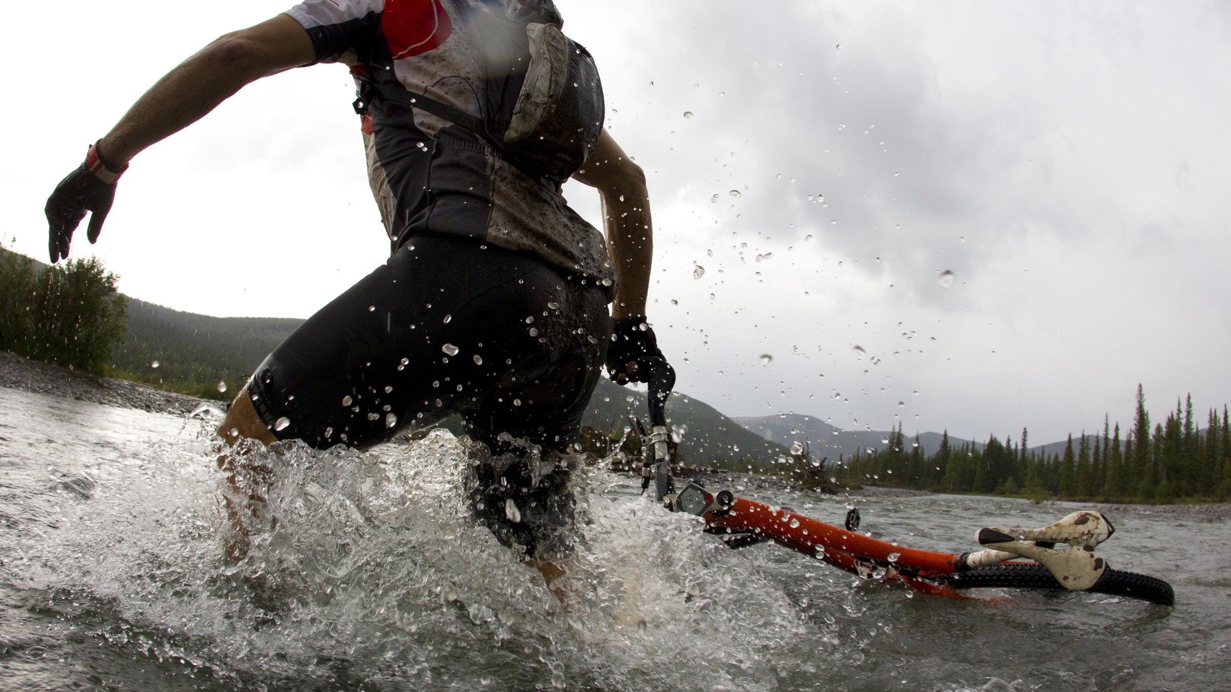 Mark Lyons was crossing a stream during a mountain bike race when he slipped into whitewater rapids.