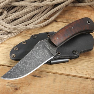 Hand-forged Damascus steel. Yeah, we think it's pretty, too.