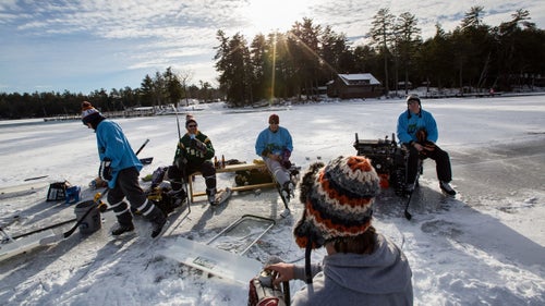 Scott Crowder (grey sweatshirt), the son of former Boston Bruins player Bruce Crowder, founded the Pond Hockey Classic, a series of tournaments held across the country, from Kalispell, Montana, to New York City. This game in Meredith, New Hampshire, kicked off with beers on the ice, but most of the crew has played competitively, and the heckling started as soon as the puck dropped.