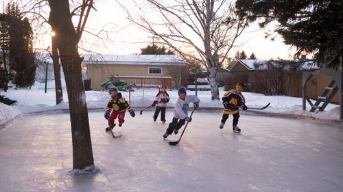 David Greedy caught the Dahl family from Mountain Iron, Minnesota playing in a backyard rink, complete with an extra obstacle. “Obviously they didn’t mind playing around the tree in the middle,” says Haines, who grew up with the Dahls. “It helps your hockey skills to keep your head up.”