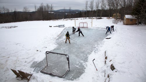 In Mount Vernon, Maine, kids play on a backyard rink while mom and dad shovel. 鈥淚t takes a ton of work to maintain those ponds and lakes,鈥 Wynia says. 鈥淭here were a lot of dedicated people who did that for the community, to get them out when it鈥檚 dark and cold.鈥
