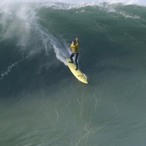 Garrett McNamara, of Hawaii, drops in on a giant wave during the Mavericks Surf Contest, Saturday, Jan. 12, 2008 in Half Moon Bay, Calif.  (AP Photo/George Nikitin)