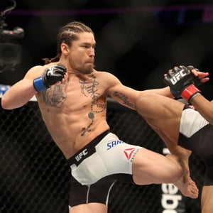 Sanders, left, took the biggest fight of his life on short notice and still won. Credit his year-round fitness.