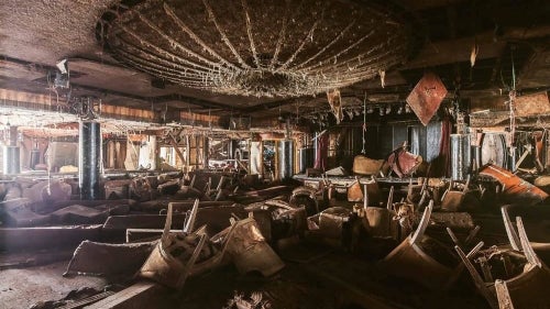 A dining room that used to feature a fabulous chandelier now lies in muddy disarray.