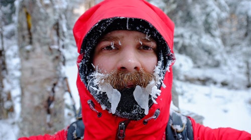 Ice forms around Gathman’s face as he hikes through, including wind-chill, -30 degree temperatures in the Mahoosuc Range.