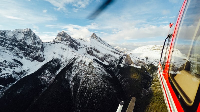Alpine Helicopters flew our party over the Three Sisters in Canmore, Alberta鈥攅n route to Marvel Pass for a backcountry camping trip.