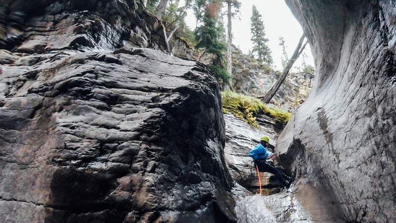 Gilberto Gil descends a fall in Two Valley Canyon.