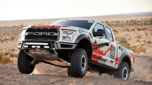 The 2017 Ford F-150 Raptor race truck gets a little air during testing. Due to liability, Ford isn't supposed to show the truck jumping at all. Take it from us: it can.