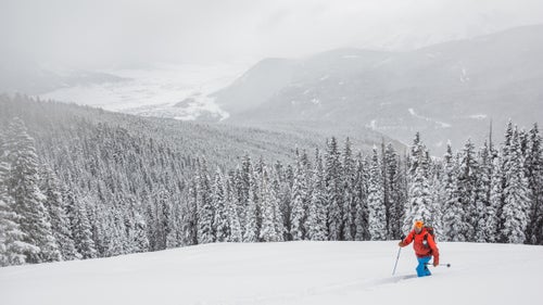 Climbing the skin track in Red Coon Glades, with Crested Butte in the background.