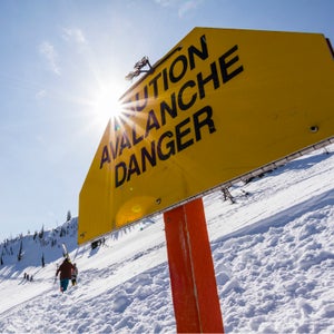 Travel: Avalanche warning sign at the backcountry entrace at Whitewater Resort, British Columbia in winter, Canada