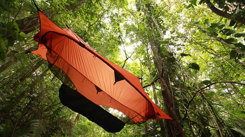 Your trusty hammock minus bugs and rain equals the best way to sleep outside.