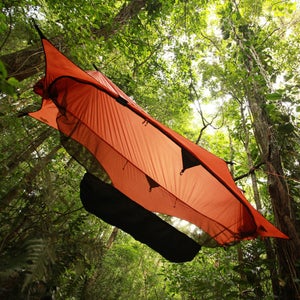 Your trusty hammock minus bugs and rain equals the best way to sleep outside.