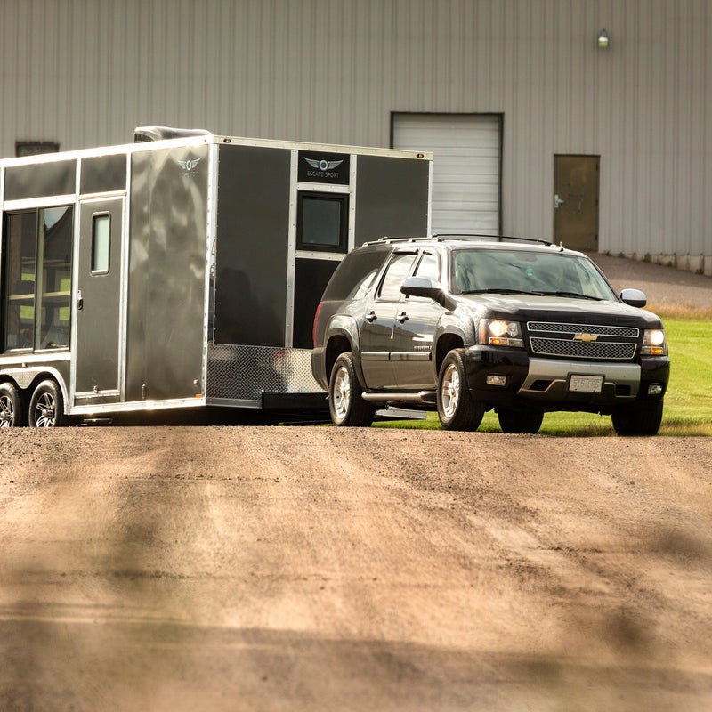Having a man cave in your basement is all well and good, but it’s even better if it’s portable. Enter the Escape Sport, which is basically a base camp on wheels. Photo: The Sport weighs between 5,000 and 6,000 pounds, depending on the model you choose. The aluminum sides and seamless aluminum roof are built on a welded-steel frame.