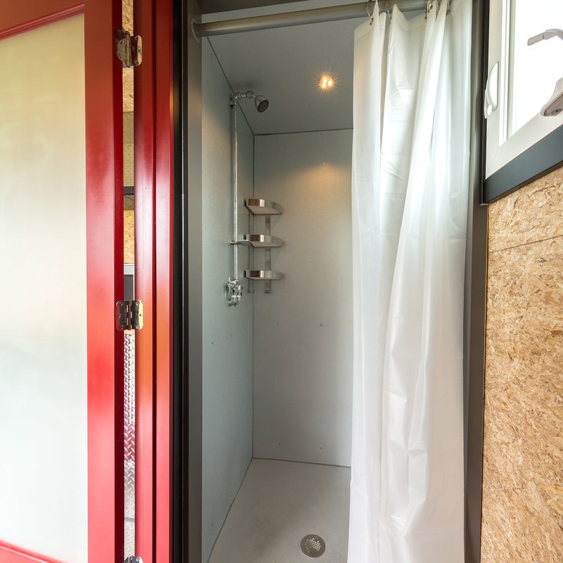 There’s no need to sacrifice modern comforts, like a shower. The Escape Sport comes with a fiberglass bath that can be upgraded to stainless steel. Hot water comes from an electric heater powered by a plug-in, generator, or solar panels.