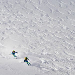 Teresa Gurdin and Victor Gurdin ski their line during the competition.