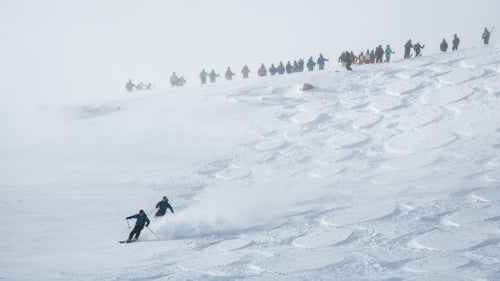 Jackson locals AJ Puccia and Brendan Levine ski their line.