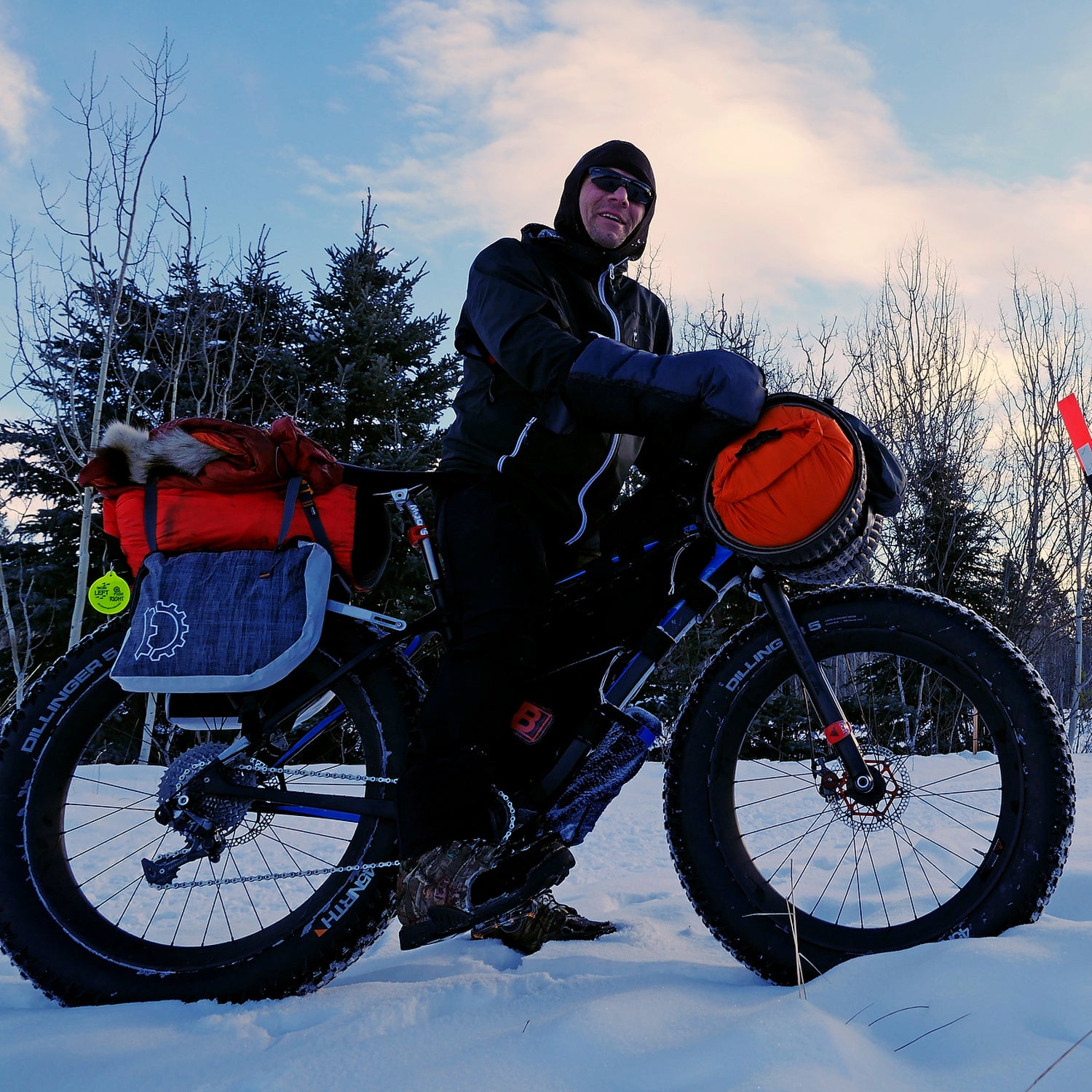 Jeff Oatley meets Brent Sass near the end of the Yukon Quest trail in Whitehorse on Monday.