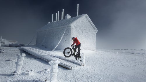 In early February, pro cyclist Tim Johnson became the first person to pedal to the top of New Hampshire’s 6,288-foot high Mount Washington in the dead of winter. The Auto Road he took up is closed during the cold months, and it’s easy to see why: the environment becomes encased in ice, and resembles Antarctica more than the Northeast.*

The mountain’s 7.6-mile Auto Road was created in 1861 and is billed as “America’s first and oldest man-made attraction.” Johnson, a six-time Cyclocross National Champion, cranked up a 12 percent grade slope and arrived at the summit in 1:45:48 on a day when the average temperature was 13 degrees and winds were gusting at 41 miles per hour.

Photo: Johnson, from Massachusetts, is familiar with the Auto Road. He first visited Mount Washington as a kid, then started competing in the Mount Washington Hill Climb race when he was 17 years old “and was able to use it as a stepping stone to turn pro,” he told Red Bull. He won the race in 2000 and 2001. But the race is held in late summer, in more bike-friendly conditions.

CORRECTION: An earlier version of this article incorrectly stated that Mount Washington is closed in the winter months. It has been clarified that the Auto Road is closed in the winter months.