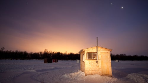 Ice-fishing huts do more than just protect from the elements these days—they've got all the amenities for an on-the-lake feast.