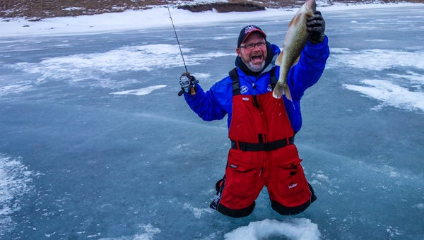 Tom Zenanko lands a big walleye at South Dakota's Hidden Hill Lodge.
