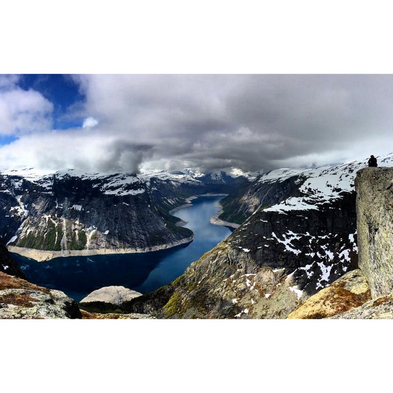 @dagsss: #WhereToTravel is Odda, Norway; more specifically to the Trolltunga hike that ends at this jaw-dropping, breath-taking, and completely humbling view of the Hardangerfjord. The hike is 22 kilometers round-trip. It was snowy when I went in June last year, but that didn't stop all of the hikers from making it to the Troll's tongue itself and basking in the sunlight once we arrived. The views were unreal, so much so that even my iPhone captured what it looked like.