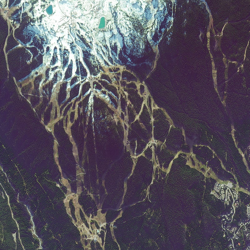 This October 2013 photo shows the stunning sprawl of British Columbia’s Whistler and Blackcomb complex. The site of the 2010 Winter Olympics, these ski mountains have amassed a tick list of superlatives—the largest combined ski area in North America, the longest continuous lift system in the world, over 8,000 acres of terrain, and an abundant maritime snowpack. The southeastern piste is the Dave Murray Downhill, where American Lindsey Vonn picked up her 2010 gold medal in the downhill. Look closely and you might make out the nearly two-mile Peak2Peak Gondola that links Whistler to Blackcomb.