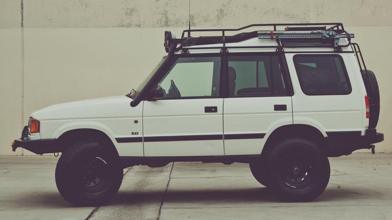 She's a 1999 Land Rover Discovery SD, upgraded for real off-roading, while retaining enough road manners to happily cruise down the highway at 80 MPH.