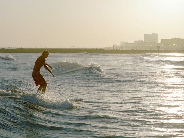 Surfing the Gulf of Mexico in Galveston, an easy drive from Houston.