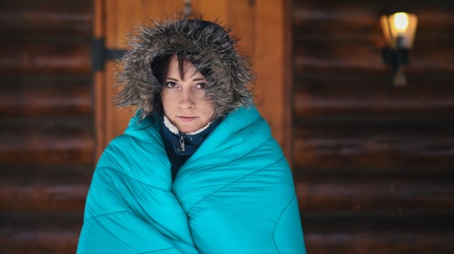 The Down Puffy is available in this solid cyan, or black, with cyan accents.