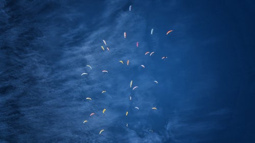 Over the winter, Matt Segal and I鈥攂oth professional climbers and beginner paragliders鈥攈eaded down to Mexico with the pie-in-the-sky goal of flying off of Pico de Orizaba. At 18,400 feet, the volcano is the highest peak in Mexico, and third highest in North America.
We stayed in world-class paragliding destination Valle de Bravo, known for it鈥檚 consistent and adventurous flying conditions. We waited in Valle for a weather window to fly off Orizaba, which was tough given that a 鈥100-year storm鈥 was buffeting the volcano with 80 mph winds and copious snow. But towards the end of our month in Mexico, winds subsided and Matt and I, along with our paragliding instructor, Matt Henzi, climbed up and flew off of Pico de Orizaba. Not bad for less than a year of paragliding! 鈥淏etter lucky than good,鈥 as I like to say!
I directed a short film of the adventure called The Fledglings, which was sponsored by the North Face. A longer, uncut version will hit film festivals this summer.
Photo: In training for Pico de Orizaba, Segal and I enter a 鈥済aggle鈥 of 30 paragliders all circling up in one thermal. A thermal is a mass, bubble, or column of rising air traveling upward from the ground.