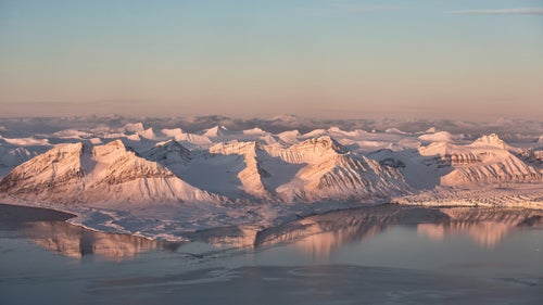 A view of the island of Spitsbergen in Svalbard. Ny-Ålesund was founded in 1917 for mining, which continued off and on until 1962, when the area was designated solely for scientific research after several fatal mining accidents.