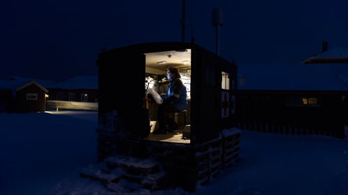 A senior scientist for the Norwegian Institute for Air Research works in a small research cabin monitoring CO2 levels in the atmosphere.