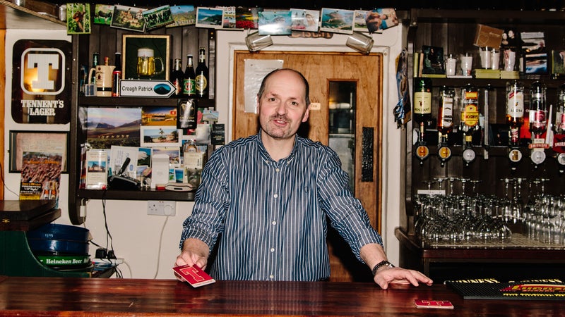 Enya's brother Bartley Brennan tending Leo's Tavern in Meenaleck.