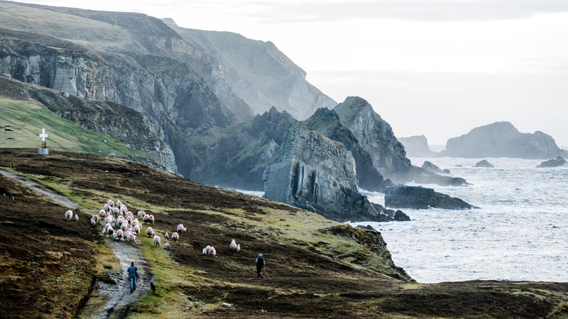 Donegal's coastline offers rocky adventure for bikers, climbers, and surfers.