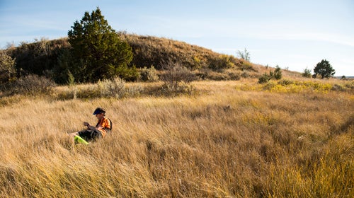 Tim Neville rests in the Grasslands of North Dakota during his 4-day adventure through Theodore Roosevelt National Park and the Maah Daah Hey Trail.
