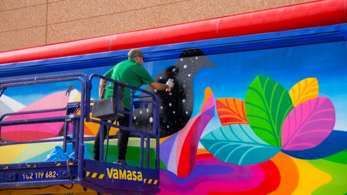 The other side of San Miguel鈥檚 truck features a colorful landscape scene. Some of the trucks will feature art on the inside, acting as mobile galleries for a handful of the artists.