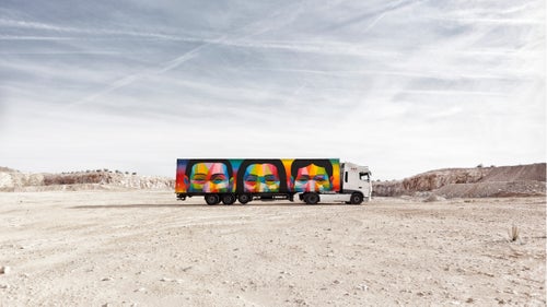Long hauls to the mountains can get boring. More often than not, any beautiful landscape outside the car window is blocked by a huge serving of McDonald鈥檚 fries plastered on the side of a semi-truck. Now, a new project in Spain is transforming these eyesores into something people will actually want to look at. For the Truck Art Project, some of Spain鈥檚 best contemporary artists are partnering with commercial shipping company Palibex to convert 100 out-of-service trucks into moving canvases. The project launched with 10 trucks this February, with plans to introduce more this year.
Photo: One of the trucks designed and painted by the Madrid-based artist Okuda San Miguel. San Miguel started as a street artist and gained a quick following for his style of multicolored geometric structures, which he calls pop surrealism.
