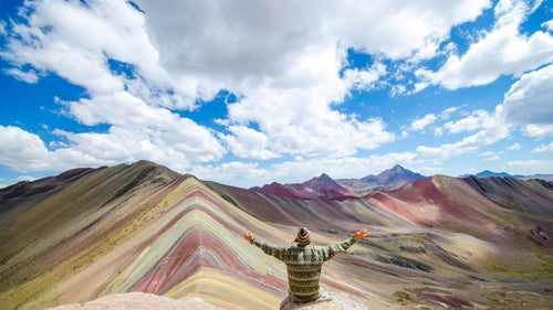 A year ago, Brandon and LeAnn Morris decided to quit their jobs in Seattle and hit the road. Not an uncommon premise for anyone that follows any adventurous Instagram accounts, but they actually did it. Six months of passport stamps from Nepal, Thailand, New Zealand, Japan, Chile, and the list goes on. Through all of their adventures, Peru emerged as one of the couple’s favorites and particularly the Ausangate trek, which led them to the striated Vinicunca Mountains and eventually their next job. The duo has since started the travel business FlashpackerConnect, which leads trips out of Cusco, with the rainbow mountains being their featured trip. Five days of high altitude trekking and you are rewarded with this view. Here, a preview of what you might see along this relatively undiscovered trail.
Photo: Typically a five-day trip, the Ausangate trek meanders through the Andes and around the 20,000-foot Ausangate mountain—the highest in the region.