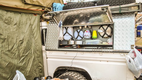 To the left of the load area we installed a small kitchen area to store the cutlery, pots, pans, and accessories. Our go-to foods: pasta of all sorts, sandwiches, braai (BBQ), and anything else cheap, local, and healthy.