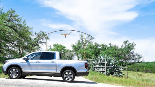 The 2017 Honda Ridgeline is a bit like a Subaru Outback with a truck bed. Like the classic Subie, it drives like a car but still has plenty of off-road features, such as multiple terrain modes in the 4WD system and nearly eight inches of ground clearance, as well as auto hill-holding when you’re rock crawling. It looks more like a normal pickup than the original Ridgeline (which Honda discontinued in 2014). Honda wants to be a challenger in the midsize truck market currently dominated by Toyota, Nissan, and Chevy. We recently drove the new truck in Texas. Here are our initial thoughts on how it stacks up against the competition.