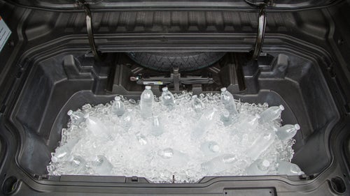 The new Ridgeline retains the in-bed trunk of the original. It auto-locks when you lock the cabin doors. The trunk also acts as a built-in 82-quart cooler with its own drain plug. Other bed options include a 400-watt power outlet and a six-speaker audio system that runs off the car’s stock audio head unit.
