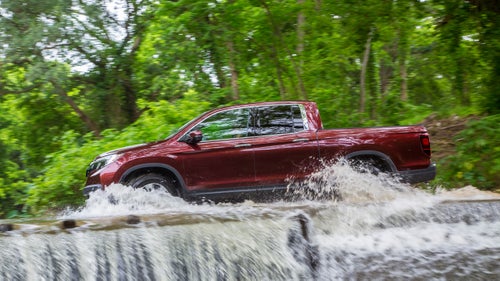 The 4WD Ridgeline has three off-road modes to handle snow, sand, or mud. We didn’t get to test the truck in snow, but it plowed right through sand, mud, and knee-deep water.