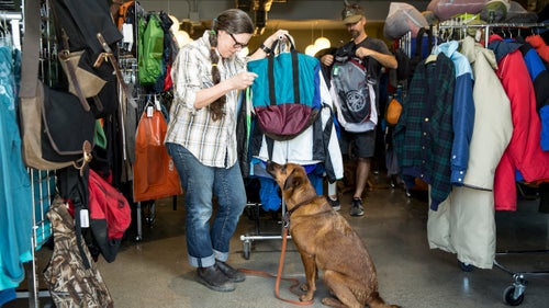 Repair Lair owner Nancy Ford and her dog Lucy.