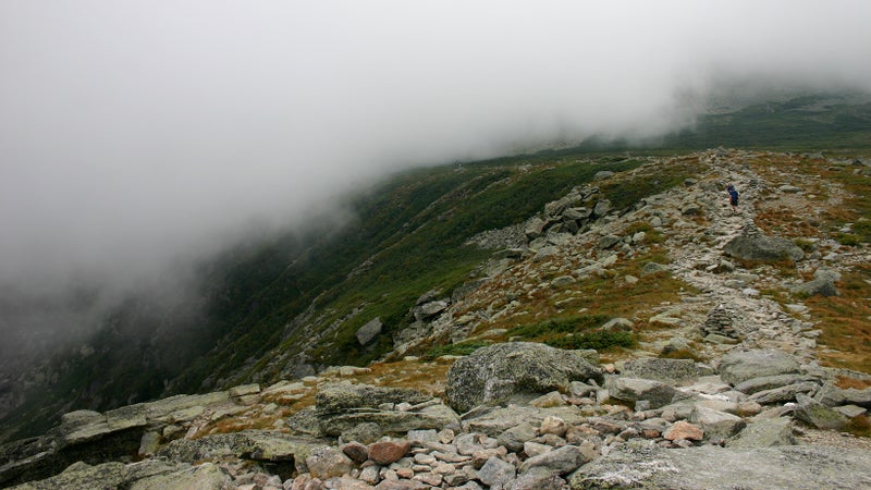 An easy portion of Lion's Head Trail. Note the loose boulders, the steep drop off, and the cairns.