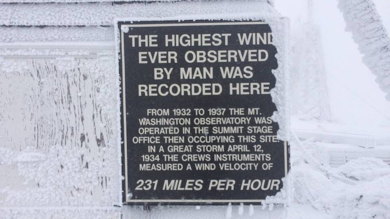 The building this sign is bolted to is held down by heavy chains that pass over its roof. During the storm that produced these speeds, the weather observers report feeling it lift off its foundation.