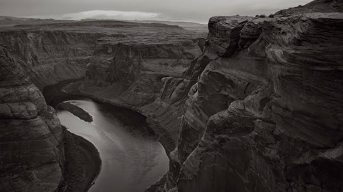 Taken in Horseshoe Bend, Arizona, the aim of this image is to reveal a stark contrast between the softness of the water and the severe, coarse face of the rocks that surround the river and have done so for centuries.