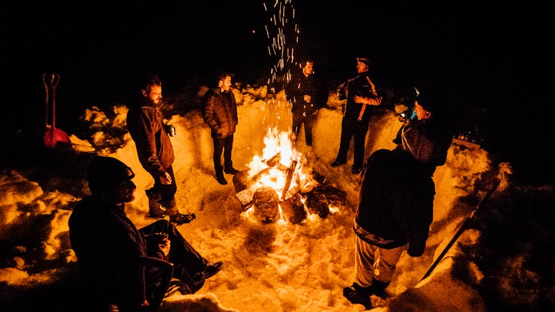 Just some dudes, a campfire, and an Alaskan winter.